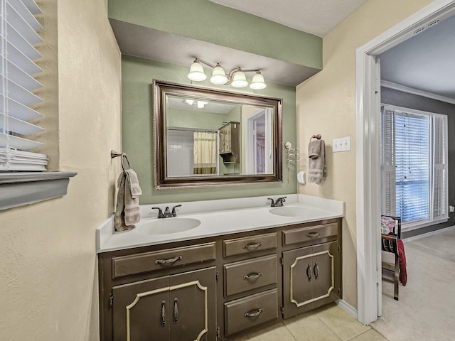 bathroom featuring tile patterned floors and vanity