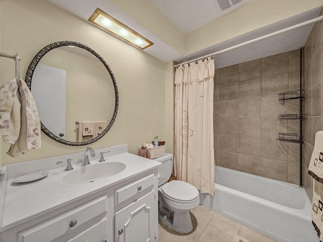 full bathroom with tile patterned floors, shower / tub combo with curtain, vanity, and toilet