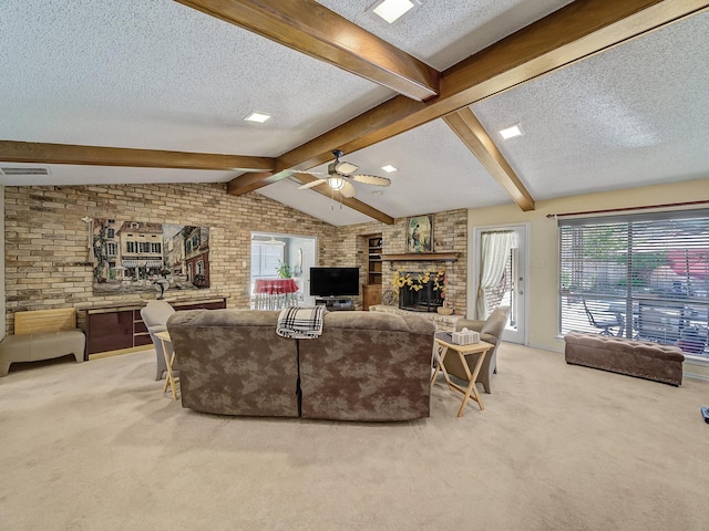 living room featuring a textured ceiling, carpet floors, and brick wall