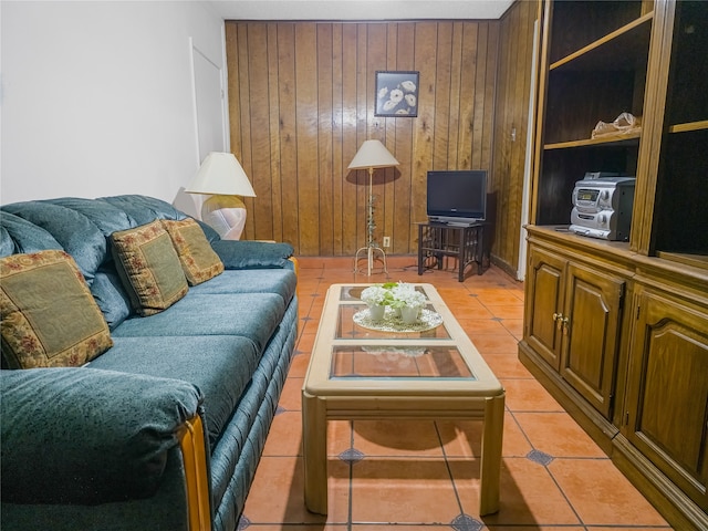 tiled living room with wood walls