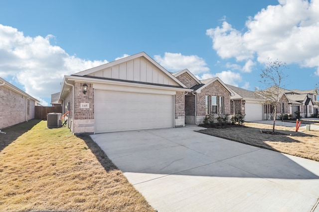 single story home with central AC unit, a garage, and a front lawn