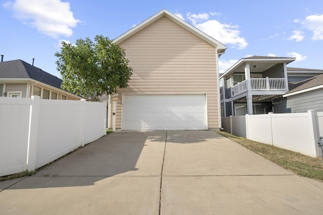 view of property exterior featuring a garage