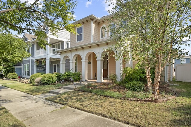 view of front facade with a porch and a balcony