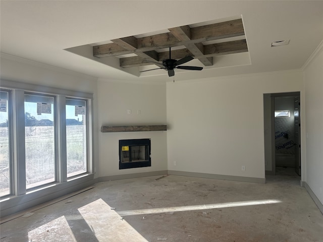 unfurnished living room with beamed ceiling, crown molding, ceiling fan, and coffered ceiling