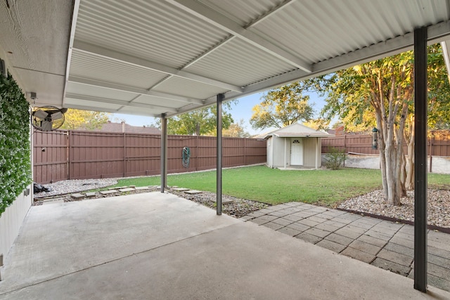 view of patio featuring a storage shed