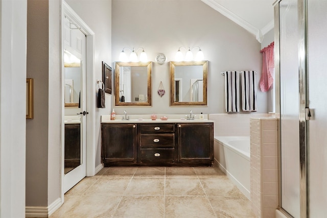 bathroom with vanity, tile patterned flooring, crown molding, and shower with separate bathtub