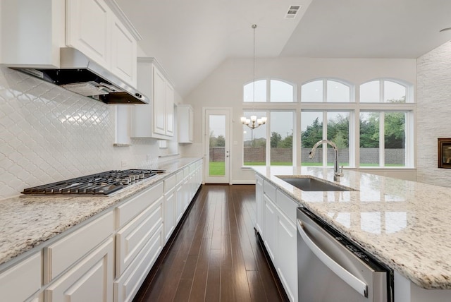 kitchen featuring stainless steel appliances, white cabinetry, sink, and wall chimney exhaust hood