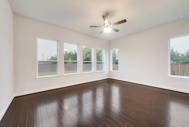 unfurnished room with hardwood / wood-style floors and ceiling fan