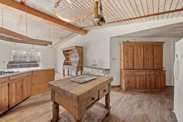 interior space with lofted ceiling with beams, light wood finished floors, and wooden ceiling