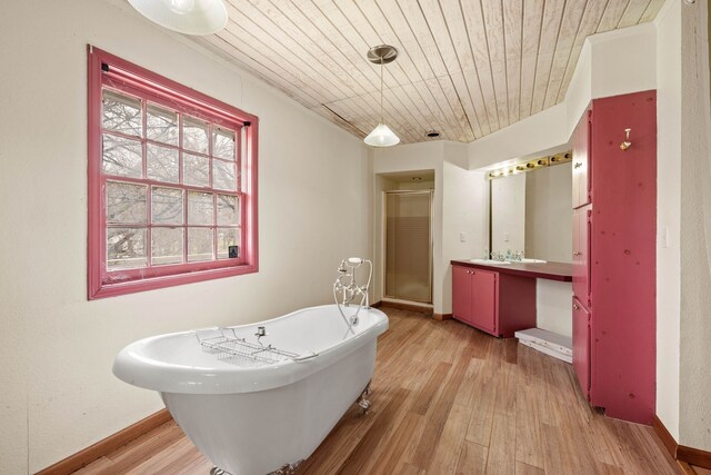 full bathroom featuring a stall shower, wooden ceiling, vanity, and wood finished floors