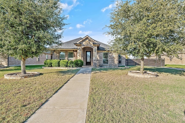 view of front of house with a front lawn