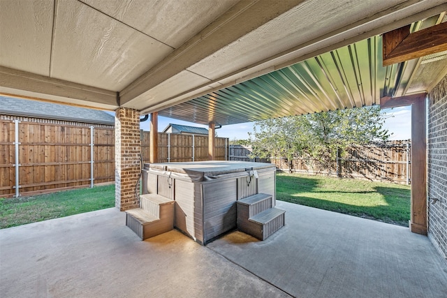 view of patio / terrace featuring a hot tub