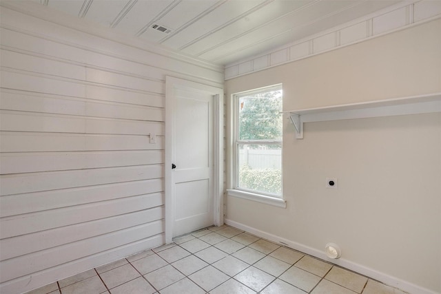 interior space featuring ornamental molding and plenty of natural light