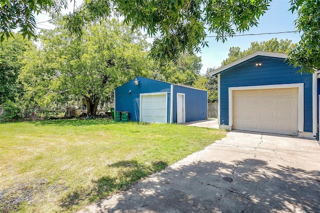 garage with a lawn