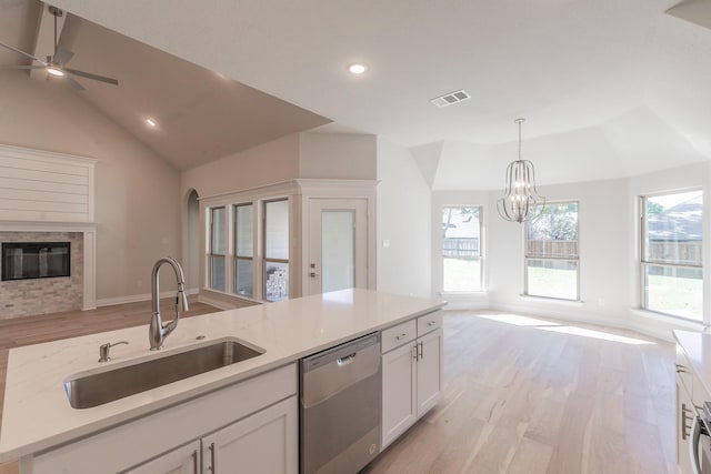 609 Keel Way, Azle, TX 76020 - kitchen featuring dishwasher, open floor plan, lofted ceiling, light wood-style floors, and a ceiling fan