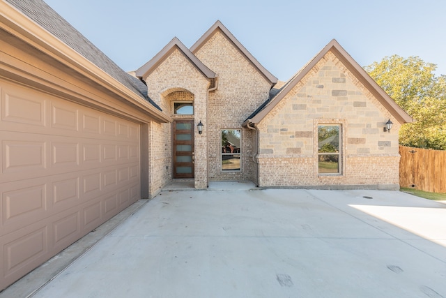 view of front of home featuring a garage