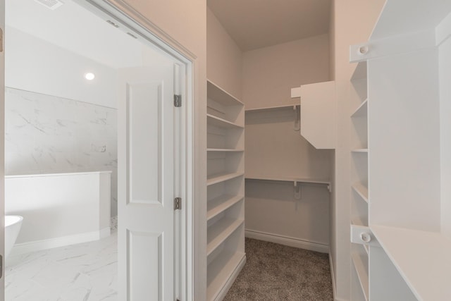 609 Keel Way, Azle, TX 76020 - spacious closet with marble look tile flooring