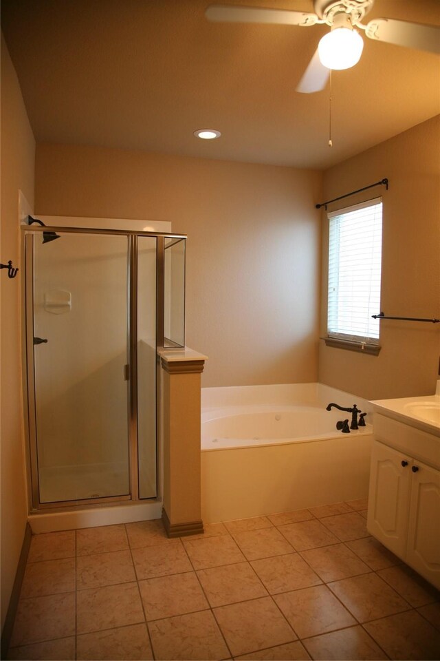 10133 Sanden, Mckinney, TX 75072 - full bathroom featuring tile patterned flooring, a shower stall, a bath, and vanity