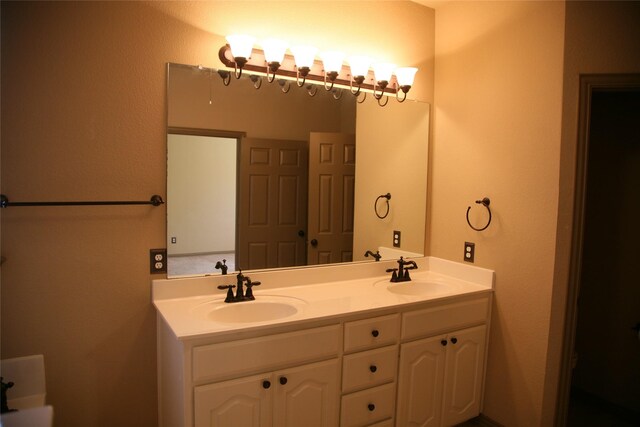 10133 Sanden, Mckinney, TX 75072 - bathroom with double vanity and a sink