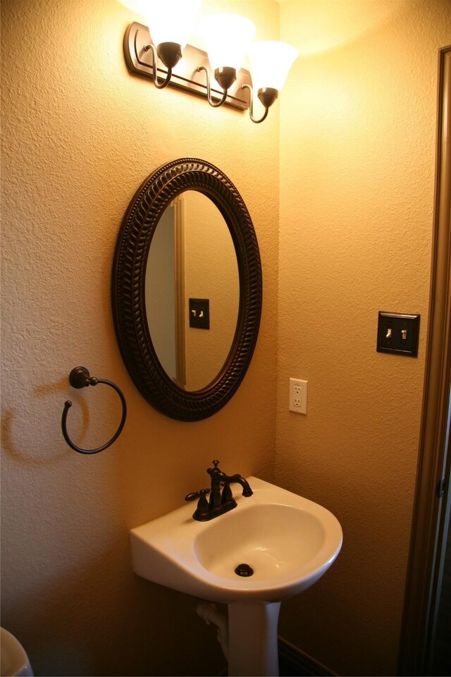 10133 Sanden, Mckinney, TX 75072 - bathroom with a chandelier
