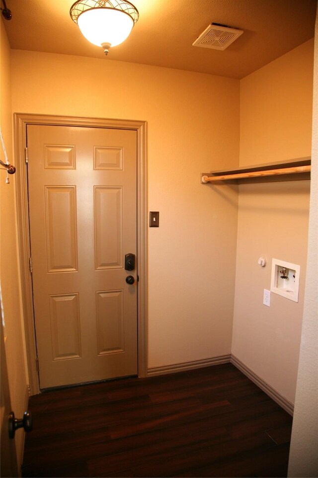 10133 Sanden, Mckinney, TX 75072 - washroom featuring laundry area, visible vents, baseboards, hookup for a washing machine, and dark wood-style floors