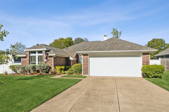 ranch-style house featuring a front lawn and a garage