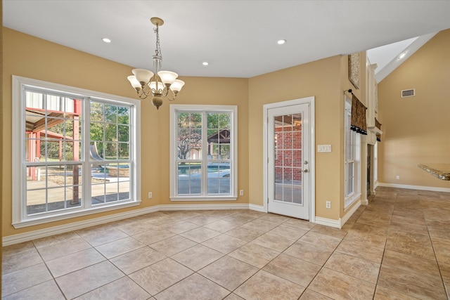 unfurnished dining area featuring light tile patterned floors, vaulted ceiling, and an inviting chandelier