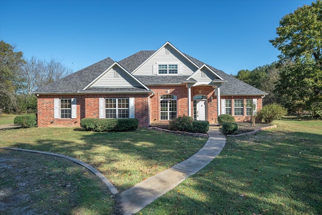 view of front of home with a front yard