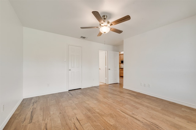 interior space with ceiling fan and light hardwood / wood-style floors