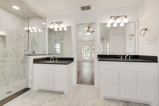 bathroom featuring vanity, hardwood / wood-style flooring, ceiling fan, and a shower with shower door