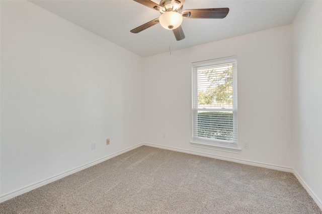 unfurnished room featuring carpet floors and ceiling fan