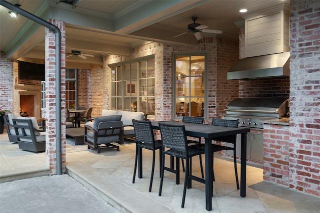 view of patio / terrace with an outdoor living space with a fireplace, an outdoor kitchen, area for grilling, and ceiling fan