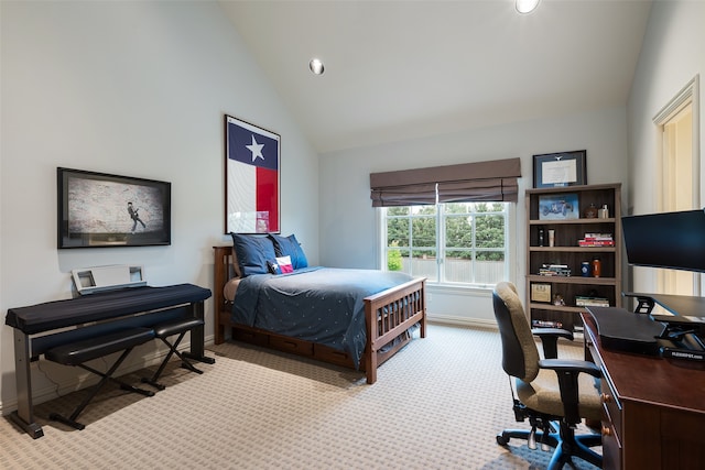 carpeted bedroom featuring high vaulted ceiling