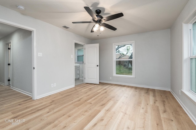 unfurnished bedroom with ceiling fan and light hardwood / wood-style flooring