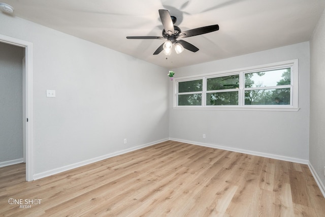 spare room featuring ceiling fan and light hardwood / wood-style floors