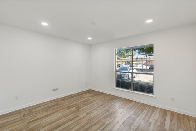 empty room with light wood-type flooring