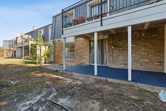 exterior space with a balcony