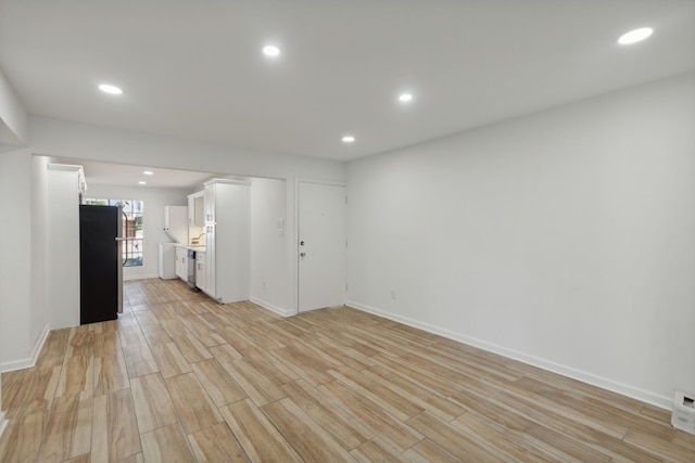 empty room with light wood-type flooring