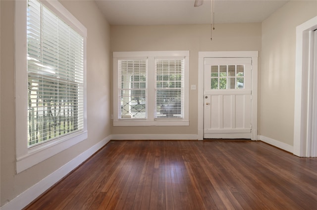 entryway with ceiling fan and dark hardwood / wood-style floors