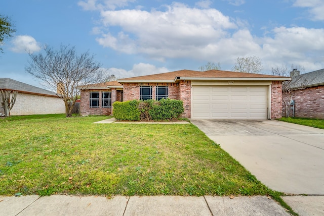 ranch-style home with a garage and a front lawn