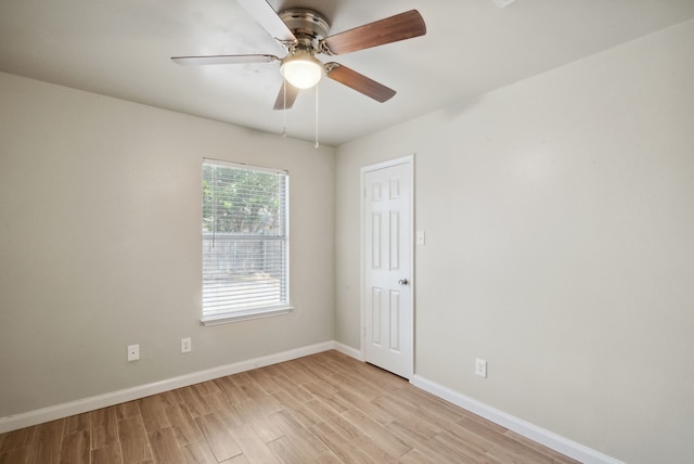 unfurnished room with ceiling fan and light hardwood / wood-style floors