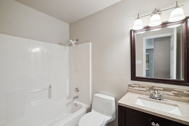 full bathroom featuring decorative backsplash, vanity, bathing tub / shower combination, and toilet