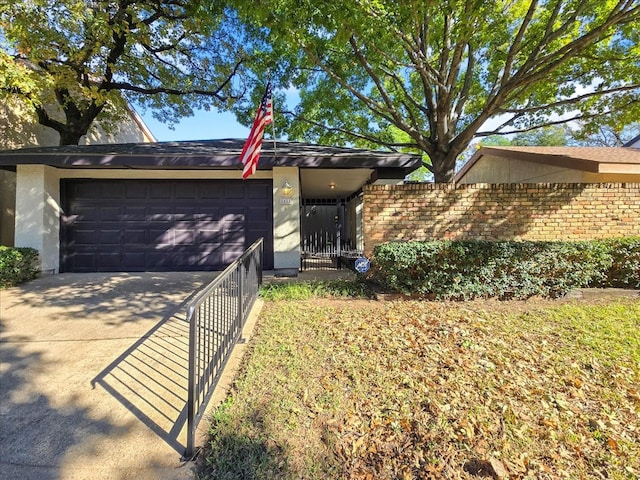 ranch-style house with a garage