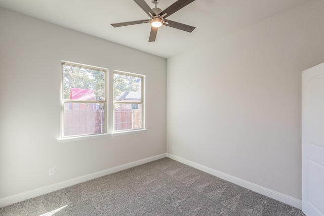 carpeted empty room with ceiling fan