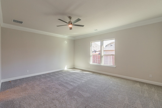 empty room with carpet, ceiling fan, and ornamental molding