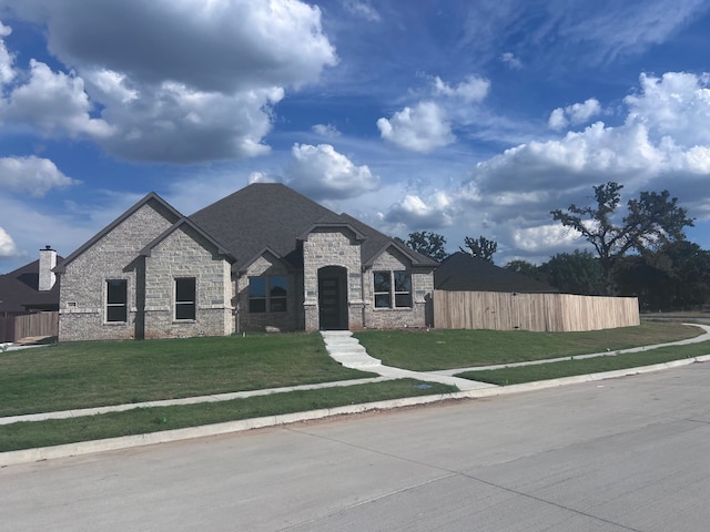 view of front of home with a front yard