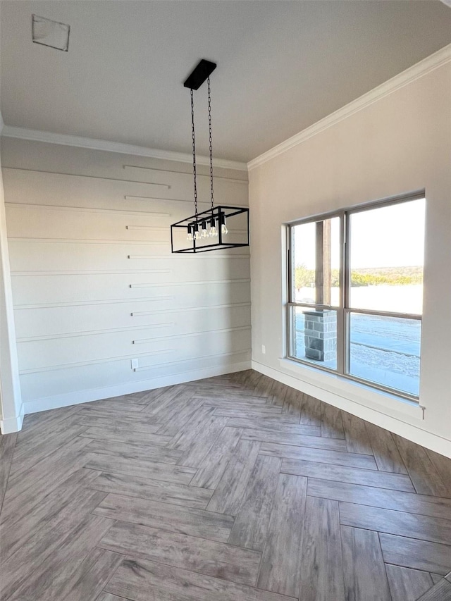 unfurnished dining area with parquet floors and crown molding