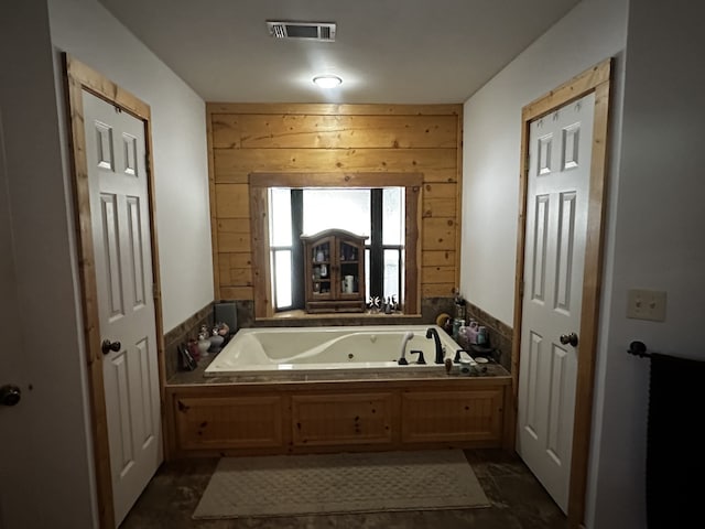 bathroom with a washtub