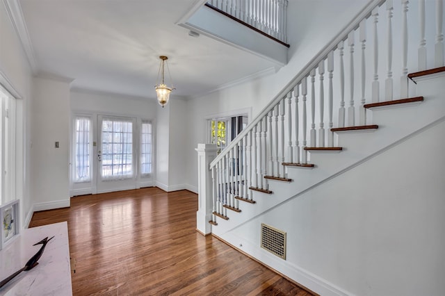 dining area featuring plenty of natural light and hardwood / wood-style flooring