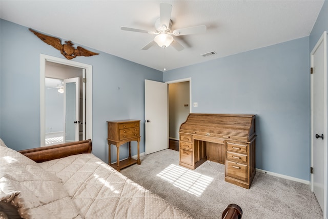 bedroom featuring light colored carpet and ceiling fan